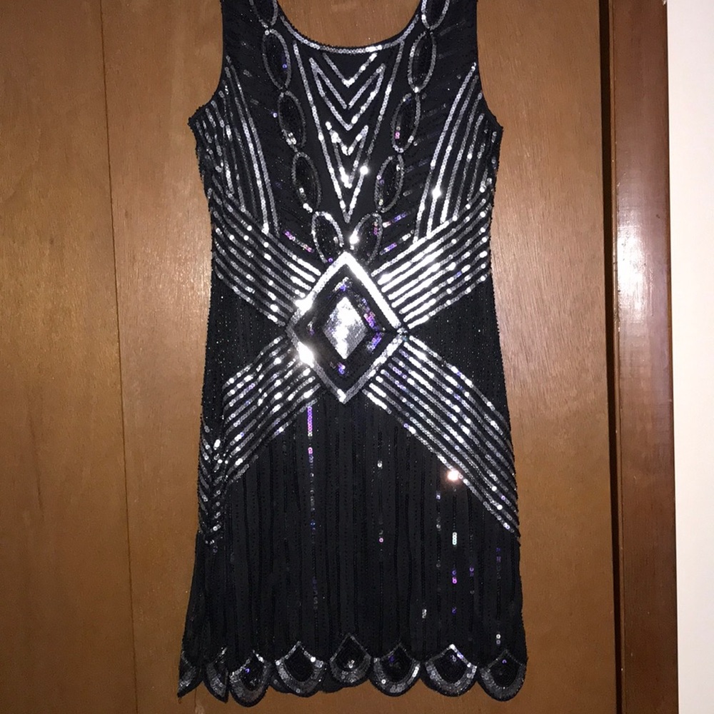 Sequin flapper dress with cut out back.